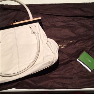 Kate Spade Bixby KISS-Lock leather purse cream